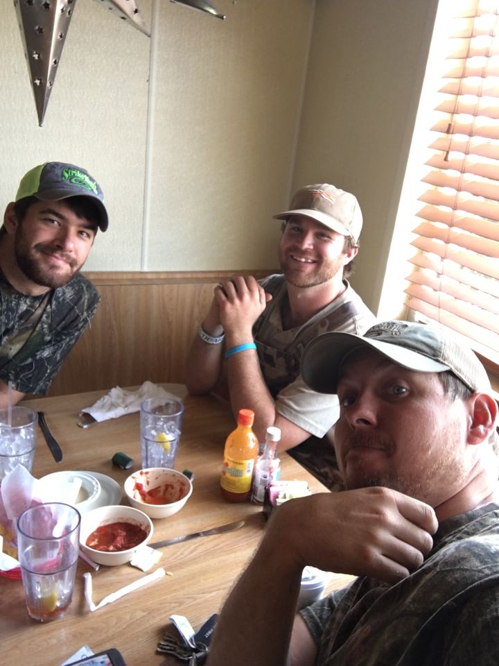 Three of the crew around the table in 2017, the year Grip Feed Co. was formed.