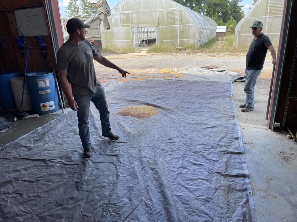 Spreading a tarp for a fresh load at the Columbiana facility.